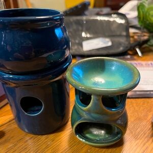 two fragrance warmers.  Blue one new in box. smaller green one.